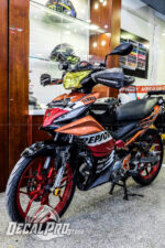 Exciter 135 Repsol Candy